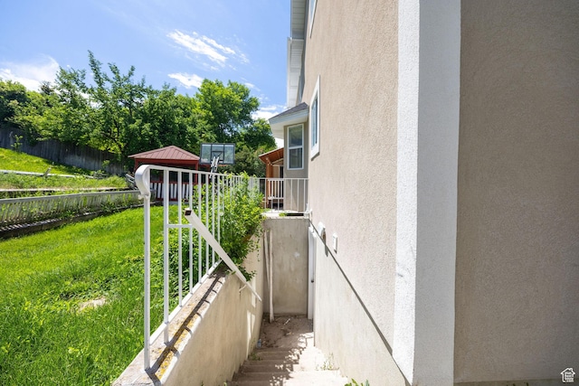 672 E Center St, Providence, UT 84332 - view of side of home featuring a gazebo and stucco siding