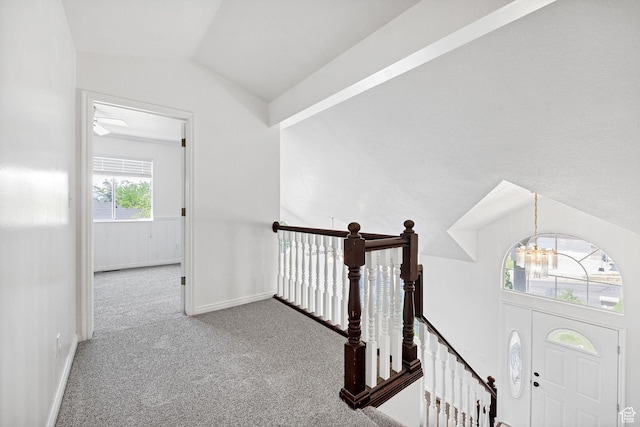 672 E Center St, Providence, UT 84332 - corridor with carpet, a chandelier, vaulted ceiling, and an upstairs landing