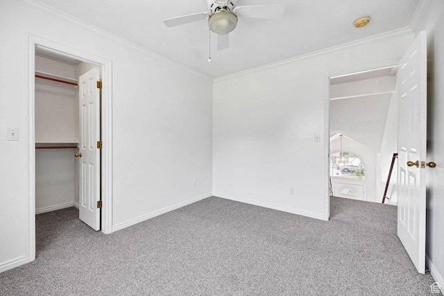 672 E Center St, Providence, UT 84332 - unfurnished bedroom with carpet floors, a walk in closet, crown molding, and ceiling fan