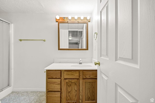 672 E Center St, Providence, UT 84332 - bathroom featuring vanity and a stall shower