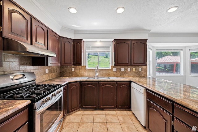 672 E Center St, Providence, UT 84332 - kitchen featuring stainless steel gas range, under cabinet range hood, dishwasher, crown molding, and decorative backsplash