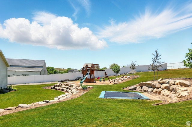 13189 N Brookside Dr, Garland, UT 84312 - fenced backyard featuring a playground