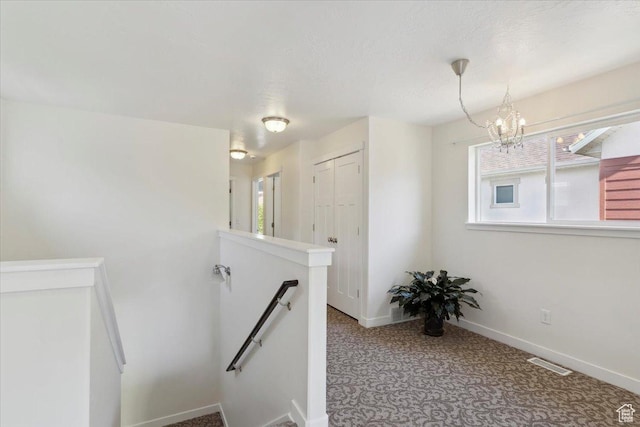 756 Spring Pond Dr, Farmington, UT 84025 - stairs featuring a chandelier and carpet floors