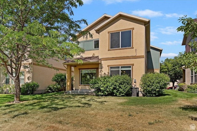 756 Spring Pond Dr, Farmington, UT 84025 - view of front of property featuring stucco siding and a front yard