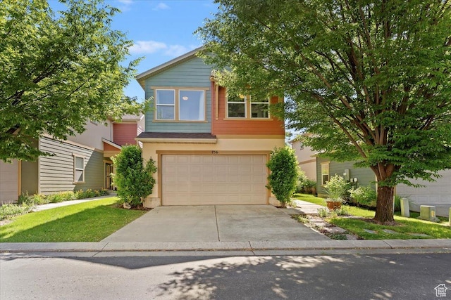 756 Spring Pond Dr, Farmington, UT 84025 - view of front facade with an attached garage, driveway, stucco siding, and a front yard