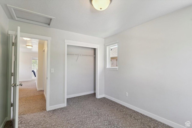 756 Spring Pond Dr, Farmington, UT 84025 - unfurnished bedroom featuring attic access, carpet flooring, and a closet