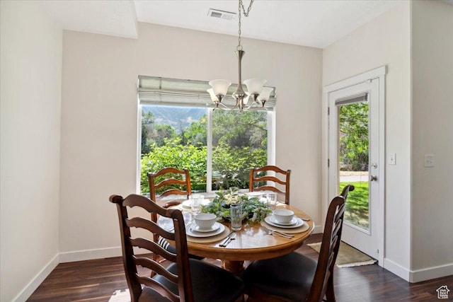 756 Spring Pond Dr, Farmington, UT 84025 - dining space with a chandelier and dark wood-style floors