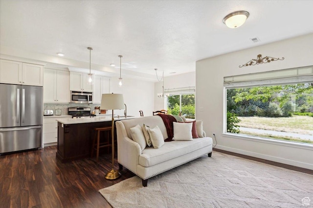 756 Spring Pond Dr, Farmington, UT 84025 - living room featuring dark wood finished floors and recessed lighting