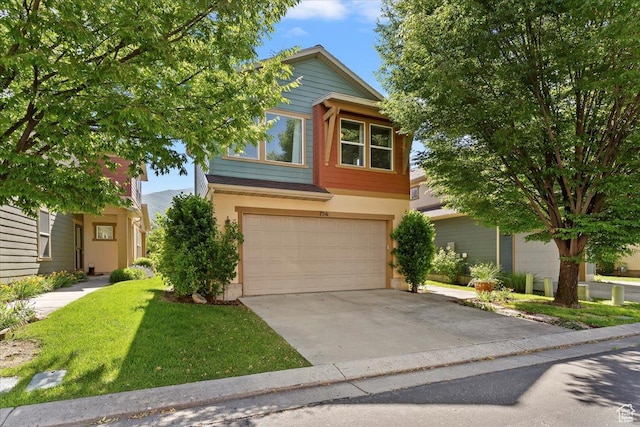 756 Spring Pond Dr, Farmington, UT 84025 - view of front of home with an attached garage, driveway, stucco siding, and a front lawn