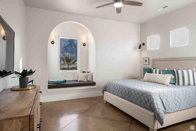 4582 S 1500 W, Hurricane, UT 84737 - bedroom with arched walkways, finished concrete floors, and a ceiling fan