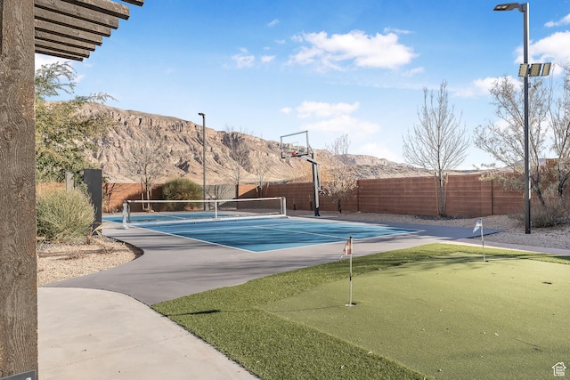 4582 S 1500 W, Hurricane, UT 84737 - view of tennis court with a putting area and a mountain view