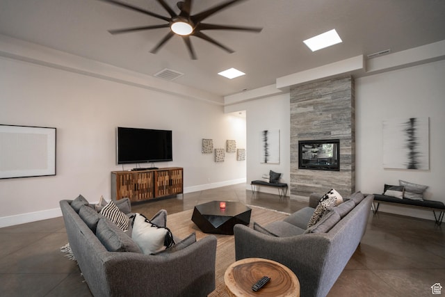 4582 S 1500 W, Hurricane, UT 84737 - living room featuring a ceiling fan and a fireplace