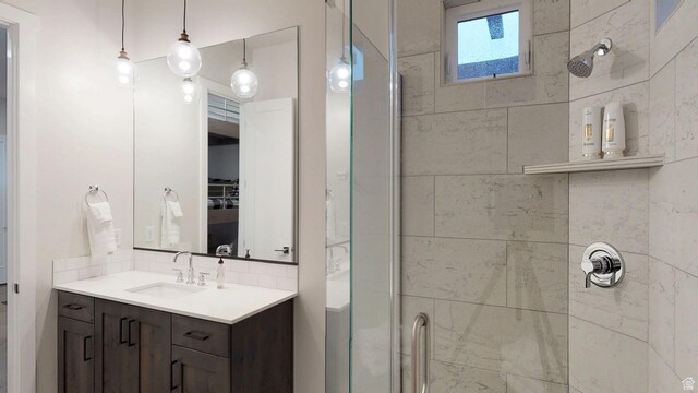 4582 S 1500 W, Hurricane, UT 84737 - full bath featuring a stall shower, vanity, and decorative backsplash