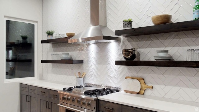 4582 S 1500 W, Hurricane, UT 84737 - kitchen featuring open shelves, stainless steel gas range oven, wall chimney exhaust hood, backsplash, and light countertops