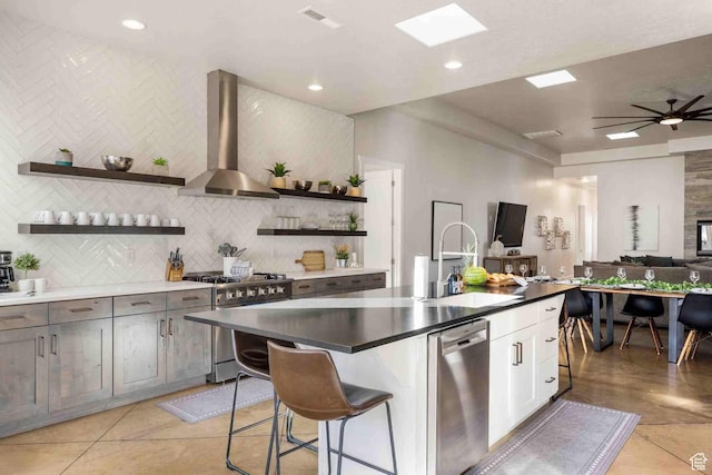 4582 S 1500 W, Hurricane, UT 84737 - kitchen with stainless steel appliances, wall chimney range hood, open shelves, open floor plan, and backsplash