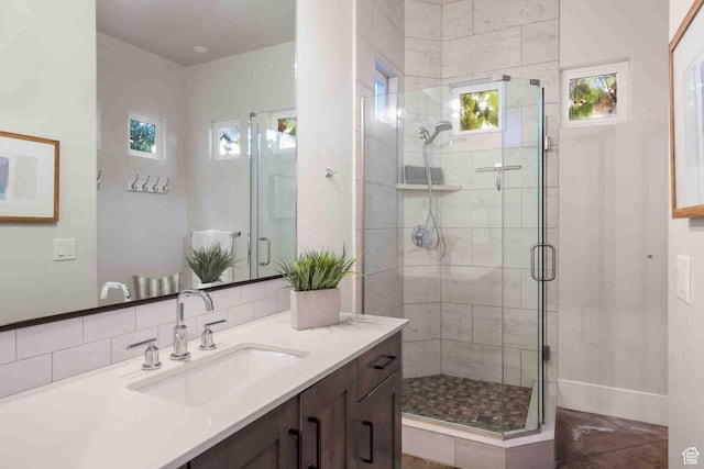 4582 S 1500 W, Hurricane, UT 84737 - full bath featuring vanity, a stall shower, and decorative backsplash