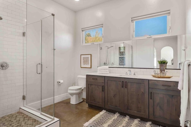 4582 S 1500 W, Hurricane, UT 84737 - full bathroom featuring a stall shower, vanity, and tasteful backsplash