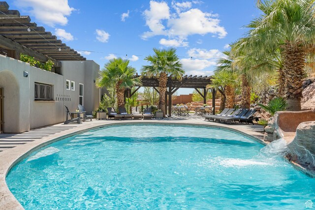 4582 S 1500 W, Hurricane, UT 84737 - outdoor pool with a pergola and a patio area