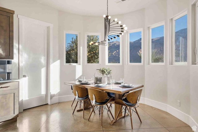 4582 S 1500 W, Hurricane, UT 84737 - dining space with a chandelier and baseboards