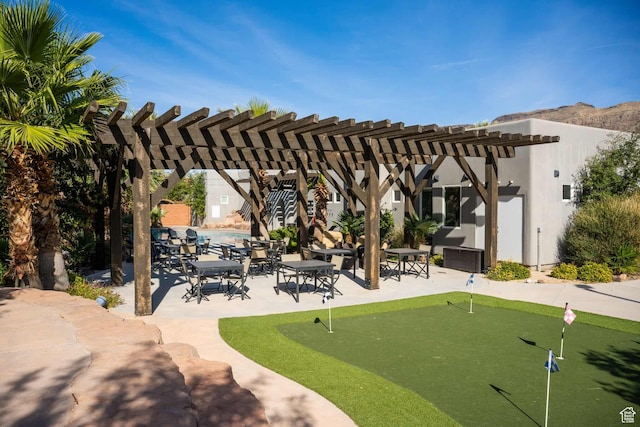 4582 S 1500 W, Hurricane, UT 84737 - view of home's community with a putting area, a pergola, and a patio area