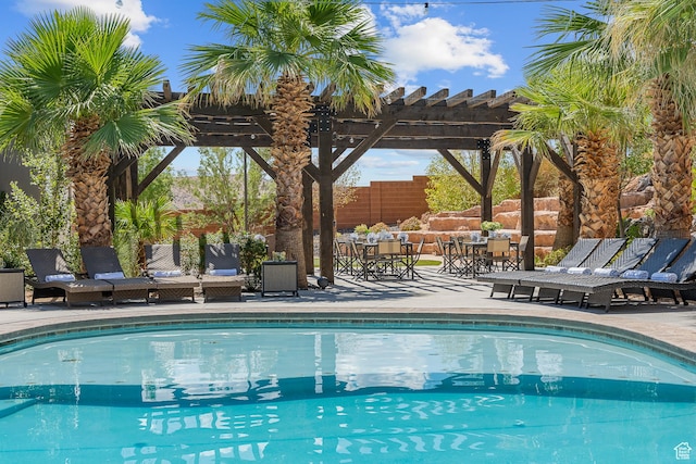 4582 S 1500 W, Hurricane, UT 84737 - swimming pool featuring a pergola, a patio area, and outdoor dining space