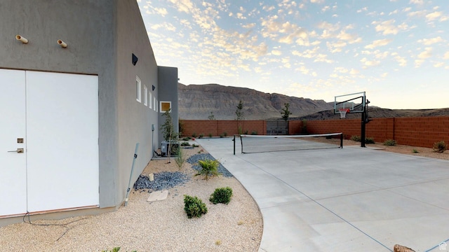 4582 S 1500 W, Hurricane, UT 84737 - view of patio with a mountain view and a tennis court