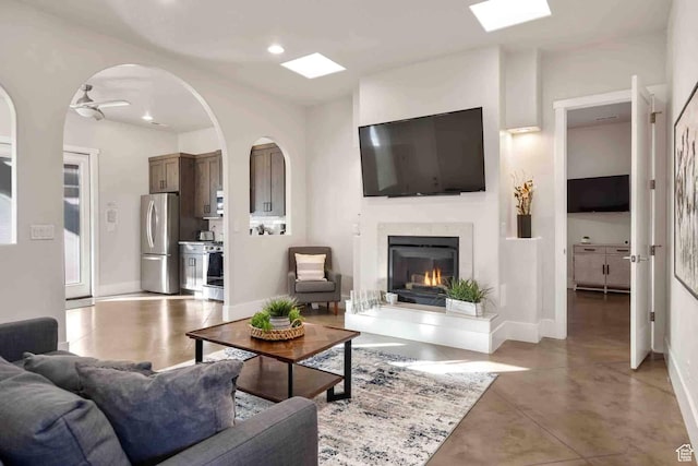 4582 S 1500 W, Hurricane, UT 84737 - living area featuring a fireplace, a ceiling fan, recessed lighting, and arched walkways