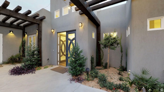 4582 S 1500 W, Hurricane, UT 84737 - doorway to property featuring french doors, stucco siding, a patio, and a pergola