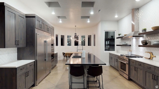 4582 S 1500 W, Hurricane, UT 84737 - kitchen featuring premium appliances, open shelves, backsplash, light countertops, and recessed lighting