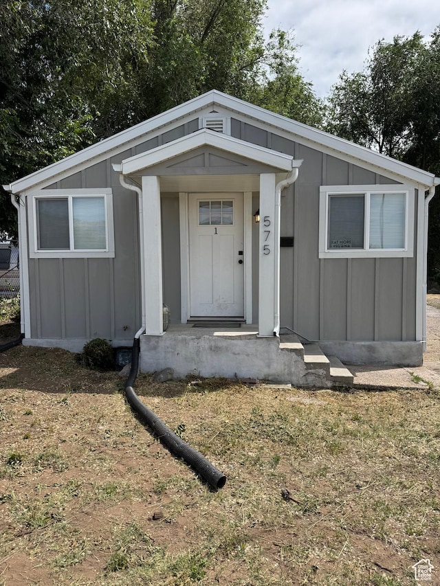575 40th St, Ogden, UT 84403 - view of front of house featuring board and batten siding
