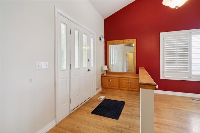 3181 E Deer Creek Cir, Cottonwood Heights, UT 84121 - foyer with light wood finished floors and high vaulted ceiling