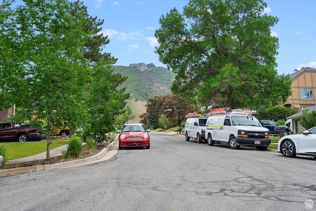 3181 E Deer Creek Cir, Cottonwood Heights, UT 84121 - view of asphalt street featuring a mountain view and curbs