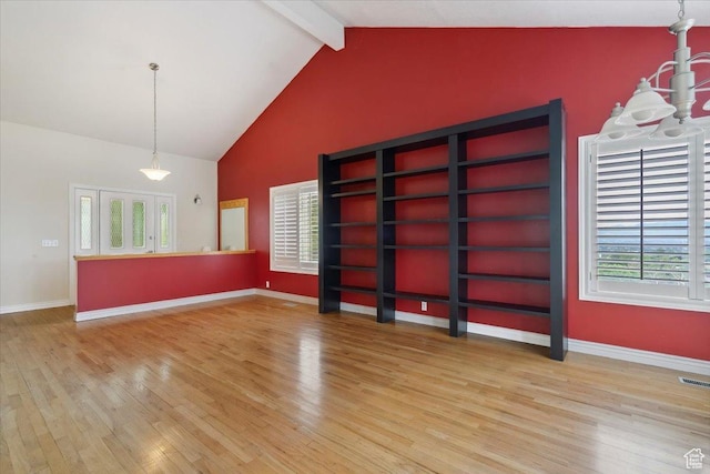 3181 E Deer Creek Cir, Cottonwood Heights, UT 84121 - unfurnished room with light wood-style floors, beam ceiling, plenty of natural light, high vaulted ceiling, and a chandelier