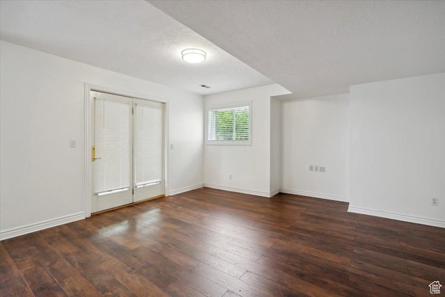 3181 E Deer Creek Cir, Cottonwood Heights, UT 84121 - spare room featuring hardwood / wood-style floors and a textured ceiling