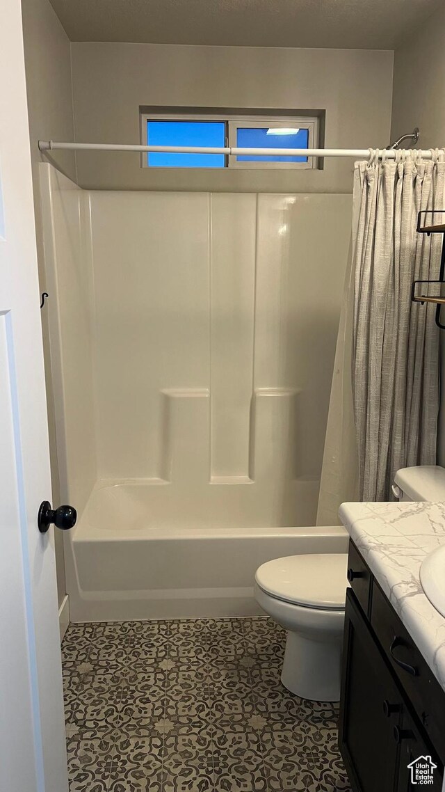 539 S Chan Dr, Grantsville, UT 84029 - full bathroom featuring shower / bath combo and vanity