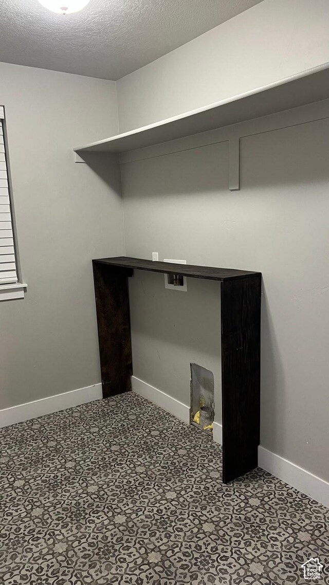 539 S Chan Dr, Grantsville, UT 84029 - laundry area featuring washer hookup and baseboards