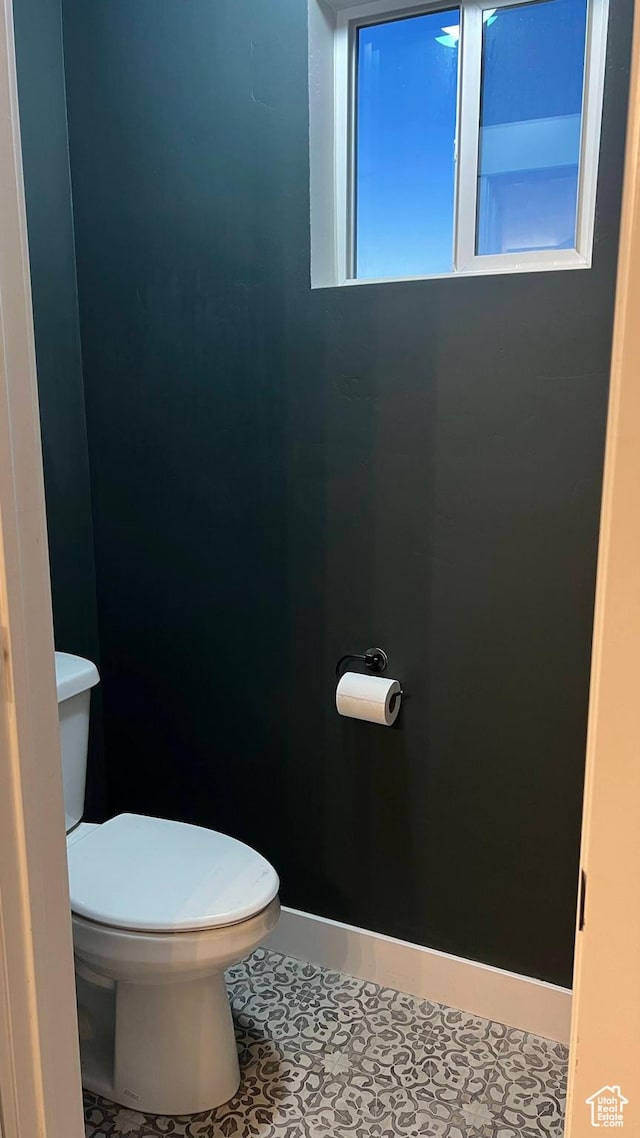 539 S Chan Dr, Grantsville, UT 84029 - bathroom with toilet and tile patterned flooring