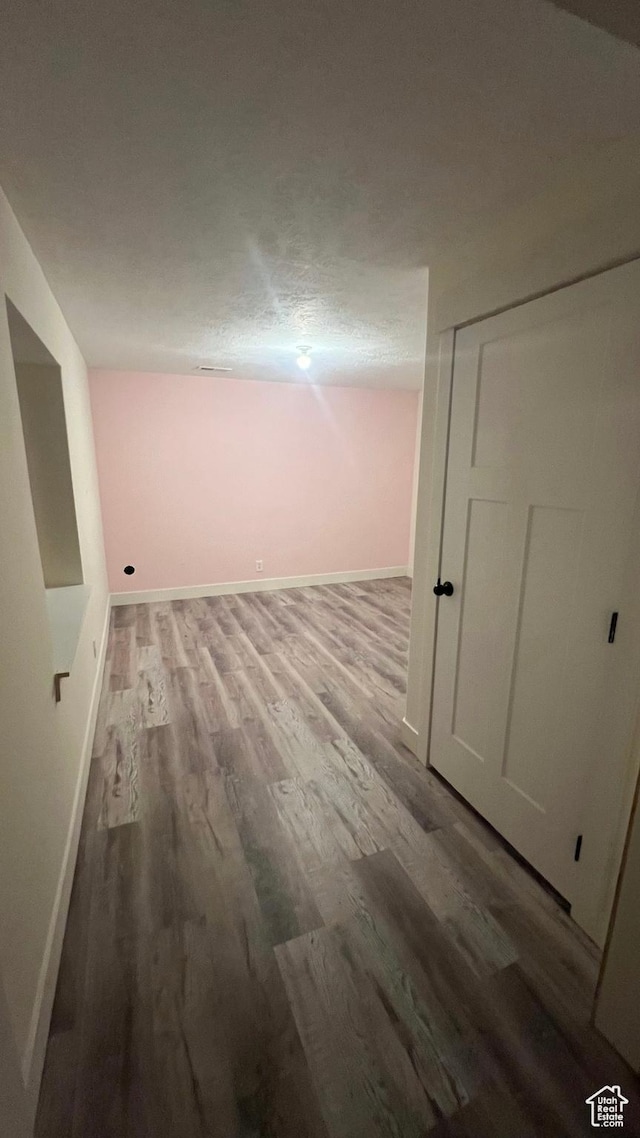 539 S Chan Dr, Grantsville, UT 84029 - hall with wood finished floors and baseboards