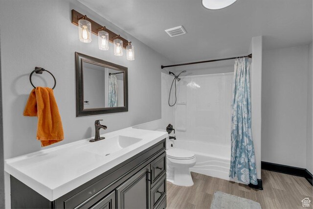 2119 Blair Cir, Santa Clara, UT 84765 - full bathroom with vanity, wood finished floors, and shower / bath combo