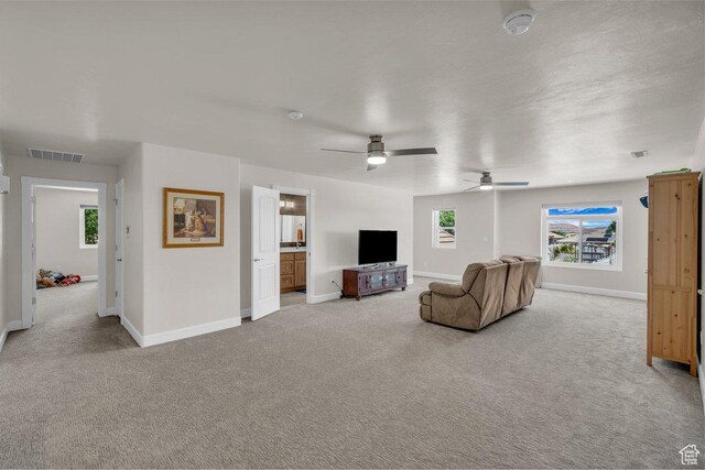 2119 Blair Cir, Santa Clara, UT 84765 - living room with carpet and ceiling fan