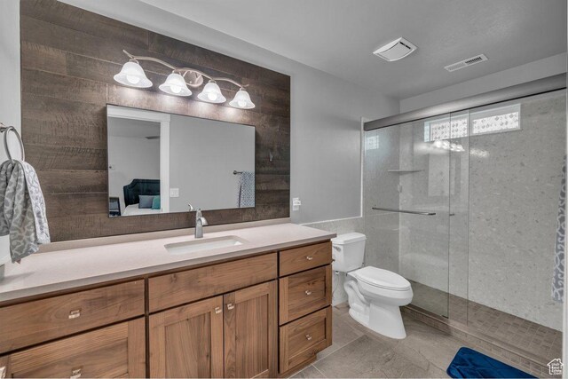 2119 Blair Cir, Santa Clara, UT 84765 - full bathroom featuring vanity, a stall shower, connected bathroom, and tile patterned floors