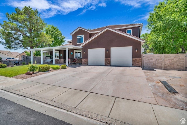 2119 Blair Cir, Santa Clara, UT 84765 - craftsman-style home with covered porch, stone siding, concrete driveway, an attached garage, and stucco siding