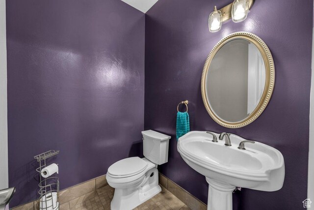 2119 Blair Cir, Santa Clara, UT 84765 - half bathroom featuring toilet and tile patterned floors