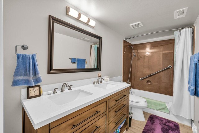 2119 Blair Cir, Santa Clara, UT 84765 - bathroom with shower / tub combo with curtain, double vanity, and wood finished floors