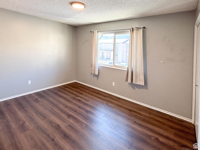 101 N 1850 W Unit 35, Cedar City, UT 84720 - empty room with a textured ceiling and dark wood-type flooring