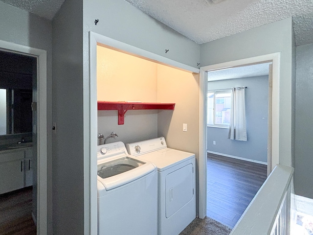 101 N 1850 W Unit 35, Cedar City, UT 84720 - laundry area with separate washer and dryer, a textured ceiling, and dark wood-style floors