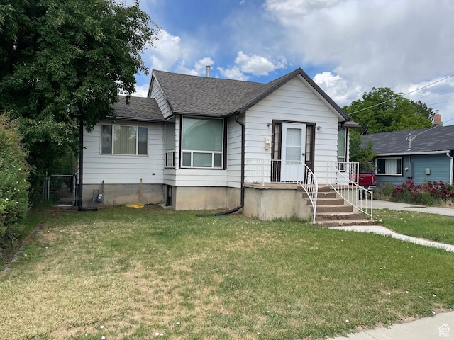 260 W 500 S, Price, UT 84501 - bungalow-style home featuring a front lawn and roof with shingles