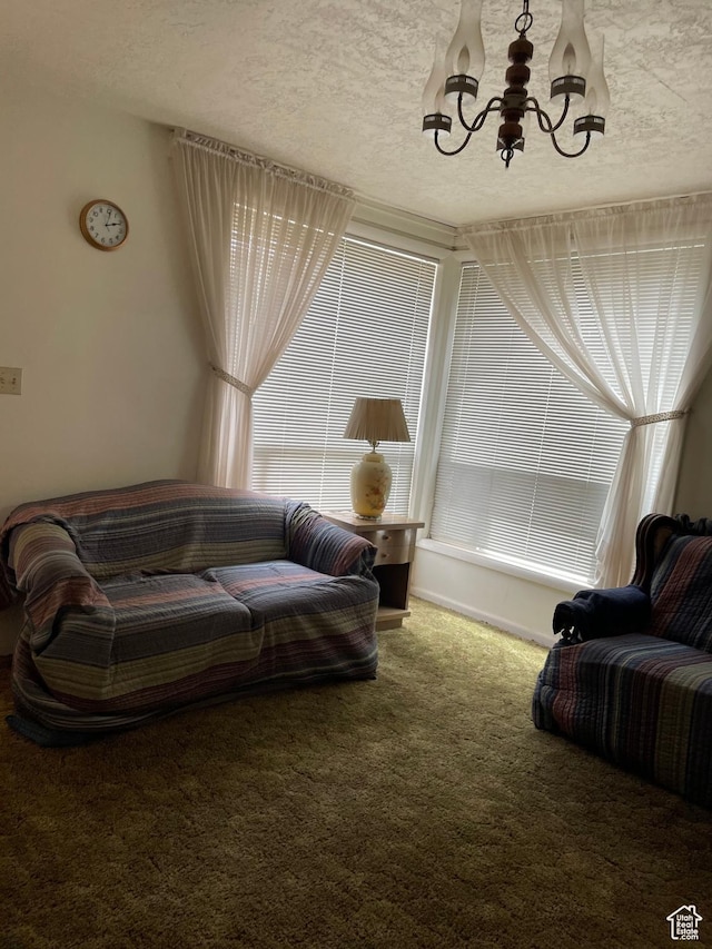 260 W 500 S, Price, UT 84501 - living area with a chandelier, carpet flooring, and a textured ceiling