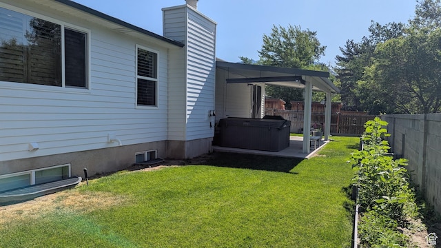 1584 E Petunia Way, Sandy, UT 84092 - fenced backyard featuring a hot tub