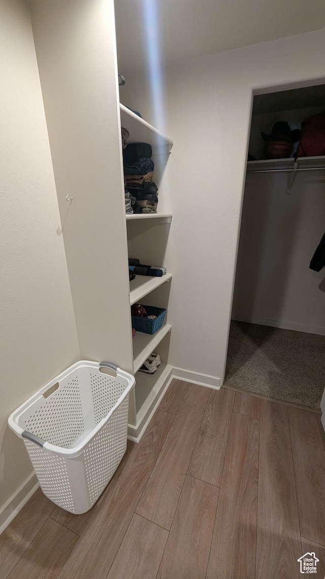 1584 E Petunia Way, Sandy, UT 84092 - spacious closet with wood finished floors